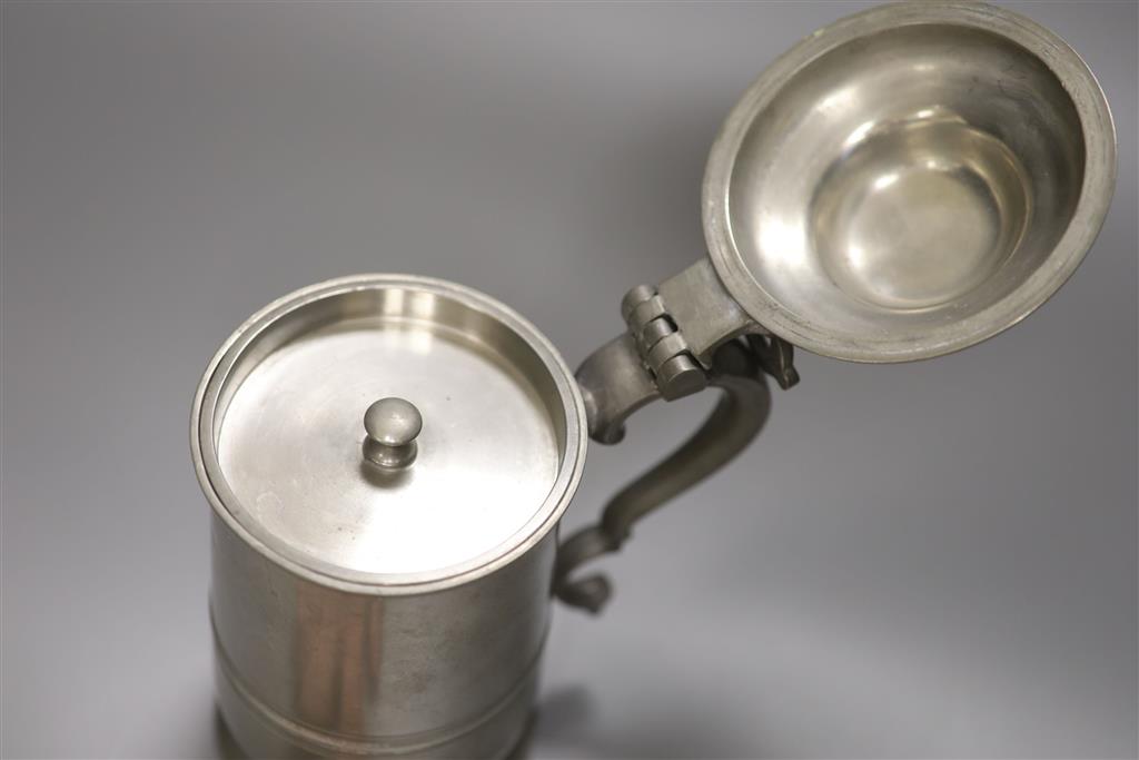 A novelty Alfred Dunhill pewter tobacco caddy, in the form of a lidded tankard, the hinged cover revealing a lidded interior, 22cm high